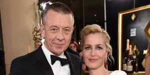Gillian Anderson with partner and Crown creator Peter Morgan at this year's Golden Globe Awards.