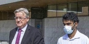 Yuvaraj Krishnan and his lawyer at the Auckland court. 