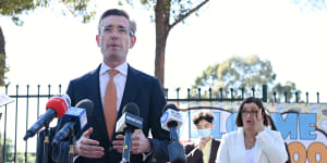 NSW Premier Dominic Perrottet and Education Minister Sarah Mitchell at Fairvale High School,in Fairfield West,on Monday.