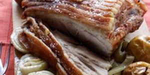 Slow-roast shoulder of pork with fennel and apples