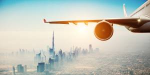 Which airline operates the most flights out of Dubai International Airport?