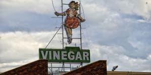 The Skipping Girl Vinegar neon above 651 Victoria Street.