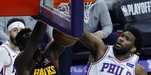 Hawks big man Clint Capela dunks over Philadelphia opponent,and the NBA’s MVP runner-up,Joel Embiid.