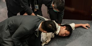 Hong Kong pro-democracy activist Ted Hui being arrested in 2020. Hui now lives in Adelaide.
