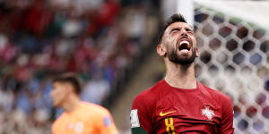 World Cup as it happened:Portugal beats Uruguay 2-0 as Bruno Fernandes stars;pitch invader carries rainbow flag across pitch