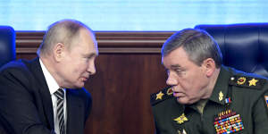 Russian President Vladimir Putin,left,and Russian General Valery Gerasimov.