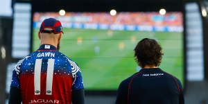 Max Gawn and another Melbourne player took in the Matildas action pre-match.