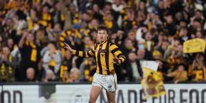 Hawks forward Jack Ginnivan celebrates a goal against Port Adelaide.