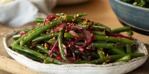 Green bean salad with pickled onions and garlic and cumin dressing.