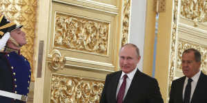 Russian President Vladimir Putin and Foreign Minister Sergei Lavrov.