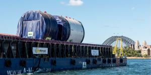 Parts of Kathleen are barged to Barangaroo where she will be assembled before she starts digging two kilometre-long tunnels under Sydney Harbour.