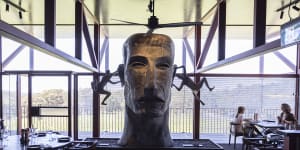The sculpture of a huge,pressed-tin head by Richard Stringer. 