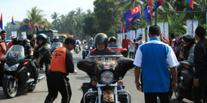 Sultan Ibrahim Iskandar on a motorbike at a show in 2015.