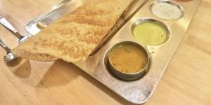 Gibson’s “excellent” masala dosa with dipping chutneys. 