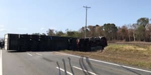 Man dies after ute and mango truck collide on Bruce Highway