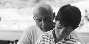 Pablo Picasso gives his young son Claude some instruction in the rudiments of sketching and painting,1955.