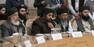 Taliban co-founder Mullah Abdul Ghani Baradar,center,with other members of the Taliban delegation attend an international peace conference in Moscow,Russia in March.