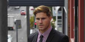 Jack de Belin arrives at Wollongong District Court on Friday.