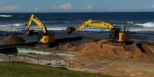 Excavators remove 1800 cubic metres of sand from Towradgi Rock Pool.