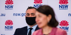 NSW Nationals leader John Barilaro with Premier Gladys Berejiklian. Mr Barilaro’s support for his government to revise the state’s emissions reductions to 50 per cent of 2005 levels by the end of this decade puts the NSW Nationals at odds with its federal party.