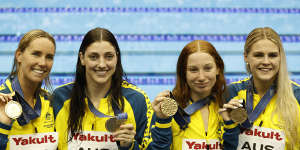 Australia’s 4x100m freestyle relay team members with their gold medals at last year’s world championships. 