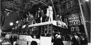 Sydneysiders celebrate on top of a bus in George Street after the announcement in Monte Carlo. September 24,1993. 
