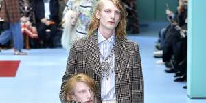 Models carried replicas of their heads at Gucci’s autumn 2018 fashion show in Milan.