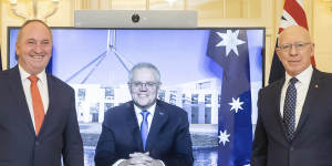 Re-elected Nationals leader Barnaby Joyce’s Sebastian runs up as Joyce poses for photos.