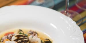Go-to dish:Scallops,grilled calamari,and mussels with vegetables a la grecque.