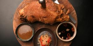 Pata (deep-fried pork knuckle with condiments).