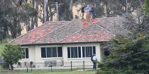 Police search the home of Natasha Darcy and Mathew Dunbar,which she stood to inherit. 