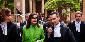 Lisa Wilkinson leaves court in November last year,flanked by her barrister Sue Chrysanthou,SC,and Ten’s barrister,Matt Collins,KC.