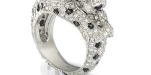 Lot 129:Platinum and diamond'Panther'ring by Cartier,circa 1991. Estimate $70,000-$90,000.