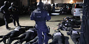The 200-odd revellers were forced to lay face down on the ground during the operation.
