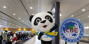 The “Jinbao” giant panda mascot welcomes visitors at Shanghai Pudong International Airport. 