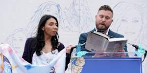 Amanda Roberts and Sky Roberts speak at a vigil for Virginia Giuffre in Washington on Saturday.