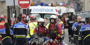 A strong explosion hit a building in Paris’ Left Bank on Wednesday,leaving dozens injured. 