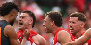 Connor Idun exchanges words with Tom Papley during the first half.