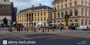 The Duchess of Cornwall Inn (right) and Strathmore House (left) facing Queen Mother Square.