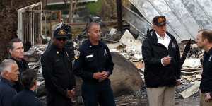 Donald Trump visits a neighbourhood impacted by the Wolsey Fire in Malibu,California,last week.