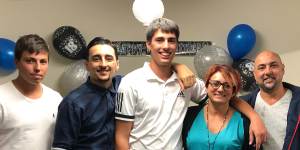 Christopher Cassaniti (centre) celebrating his 18th birthday with his family.