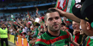 Adam Reynolds celebrates with Rabbitohs fans after starring in the 2014 grand final victory.