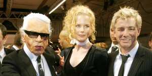 Karl Lagerfeld with Nicole Kidman and Baz Luhrman after the presentation of Chanel's spring-summer collection in 2005. 