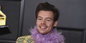 Harry Styles and his purple feather boa at the Grammys in 2021.
