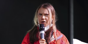 Greta Thunberg addresses protesters outside the climate summit in Glasgow on Friday,local time.