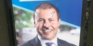 Campaign ads for Treasurer Josh Frydenberg have been defaced in Kooyong.