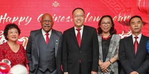 Fijian Prime Minister Sitiveni Rabuka (second from left),Wang Xuguang from China’s embassy in Fiji (centre) and Zhao Fugang (far right).
