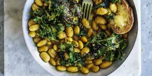 Budget-friendly beans on toast,pictured with pan-fried kale (optional).