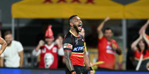 Hamiso Tabuai-Fidow celebrates for the Dolphins against the Dragons.
