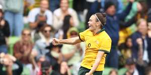 Caitlin Foord celebrates after scoring a goal. 